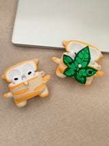 3D silicone earbud cases shaped like a woodland sprite with cream and orange fall stripes.