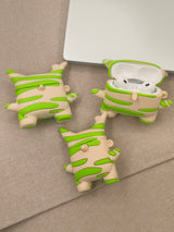 3D silicone earbud cases shaped like a woodland sprite with cream and green spring stripes.
