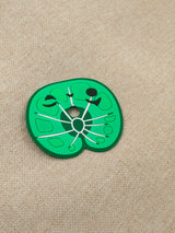 Six interchangeable green silicone leaf masks for a customizable earbud case, featuring heart, star, butterfly, and whisker shapes.