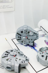 3D grey silicone earbud case shaped like a classic sci-fi spaceship freighter with detailed mechanical paneling.