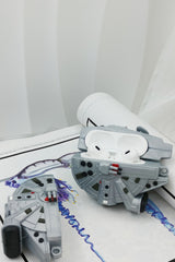 3D grey silicone earbud case shaped like a classic sci-fi spaceship freighter with detailed mechanical paneling.