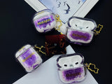 Clear earbud case filled with holographic lavender and blue liquid glitter, attached to a gold cat-shaped clip and a miniature vinyl record keychain.