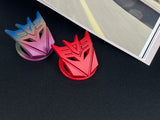 Aggressive mecha-seeker dark metal push start button cover for car interior.