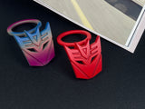 Aggressive mecha-seeker dark metal push start button cover for car interior.
