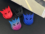 Aggressive mecha-seeker dark metal push start button cover for car interior.