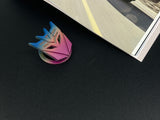 Aggressive mecha-seeker dark metal push start button cover for car interior.