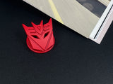 Aggressive mecha-seeker dark metal push start button cover for car interior.