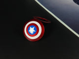 Heavy-duty star patriot alloy shield push start button cover.
